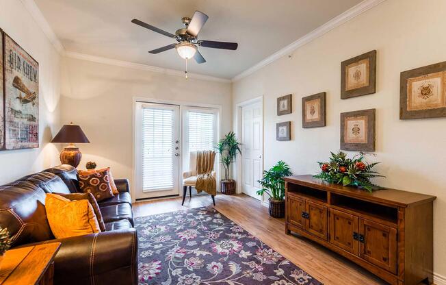 a living room filled with furniture and a fire place