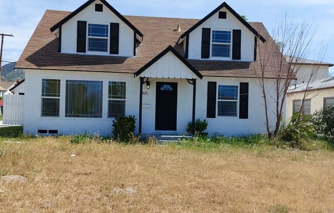 2 story house with a pool in San Bernardino