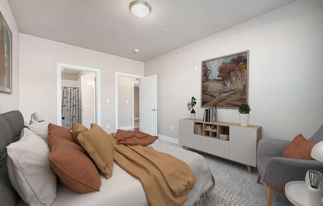 A bedroom with a bed, a chair, and a painting on the wall.