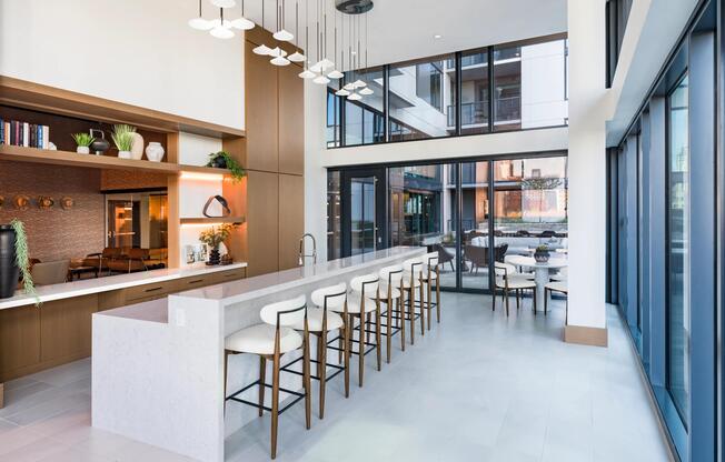 A light-filled entertaining kitchen at Modera McGavock, designed for gatherings and everyday hosting, with Nashville’s dining and music close by.