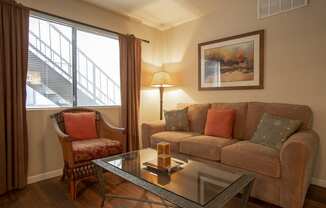 a living room with a couch and a coffee table