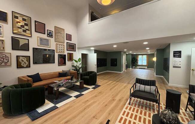 A living room with a black chair and a coffee table.