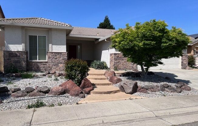 Single level 4 bedroom home close to schools and parks.