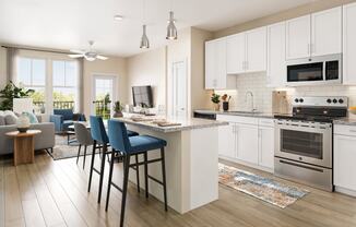 an open kitchen and living room with an island with blue chairs