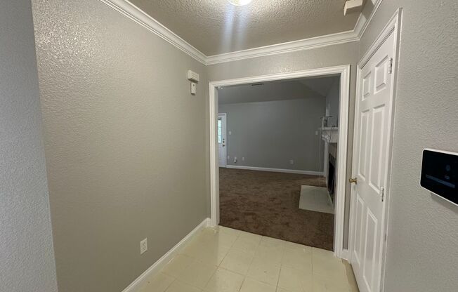 Charming 3-Bedroom Home with Spacious Living & Backyard!