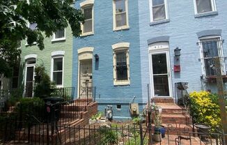 PRICE REDUCTION! A charming two bedroom one and one half bath row house located just off New Jersey Ave in the Shaw Neighborhood!