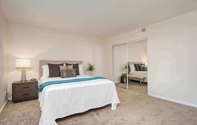 Table Lamp, Pillow In Bedroom at Wilbur Oaks Apartments, Thousand Oaks, CA