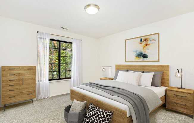 A spacious bedroom with a large bed and a window at Tanglewood Apartments, Oak Creek