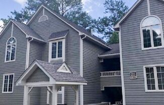 STUNNING TOP-FLOOR LAKEFRONT CONDO IN LOCHMERE! GORGEOUS VIEWS & BEAUTIFUL UPGRADES!