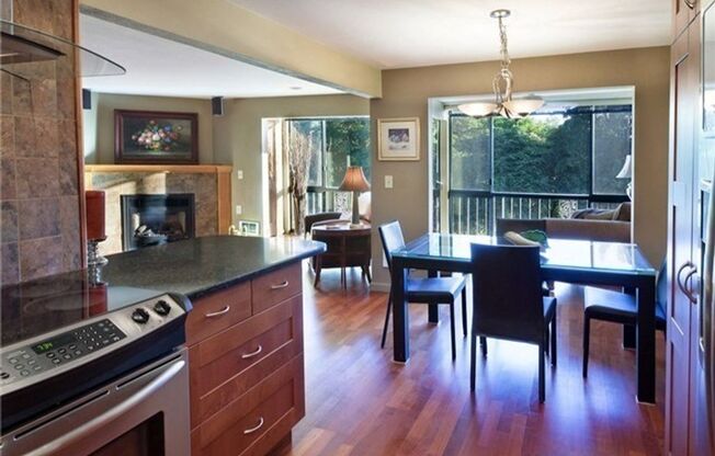 Green Lake Park Haven: Stunning 2-Bed Condo with Park Views, Parking, and More!