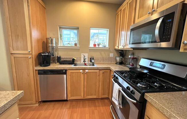 Charming 2-Bed Townhome in Sherwood with Pool Access, Garage, and Vaulted Ceilings!