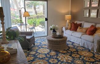 furnished living room with sliding glass doors