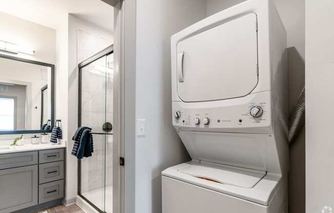 a washer and dryer in apartment at Preston Ridge Cary, NC