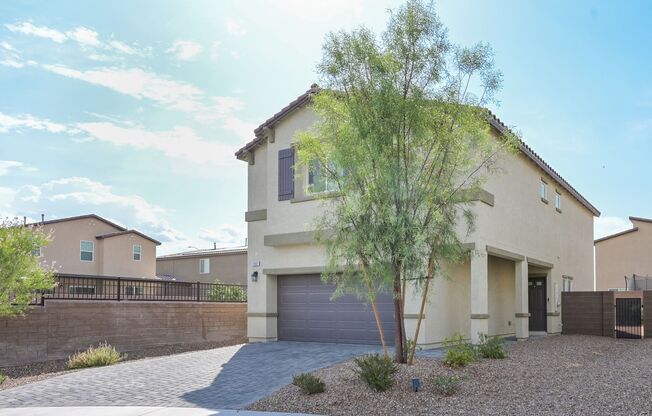 NW!! Gated!! Built 2023!!!! Corner Lot!! Low Maintenance Desert Landscape Front!! Patio & Synthetic Grass in Back!! Pet Friendly!!