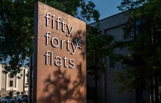 fifty forty flats sign