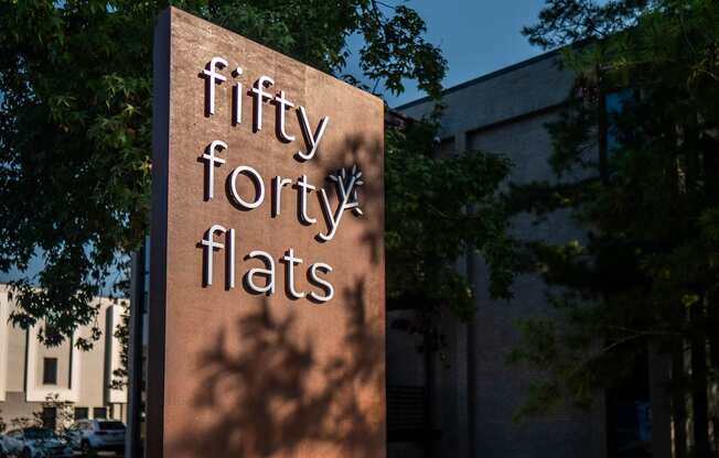 fifty forty flats sign