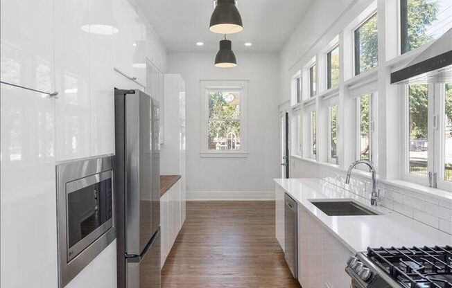 Roosevelt Row historic and updated home close to everything downtown! Truly unique!!!  Absolute stunner that is an Oasis in the City!!!  Everything redone!!  True Charmer!!!