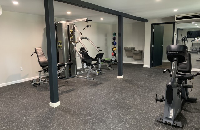 State-of-the-art fitness weights in gym exclusively for The Wellington apartment residents
