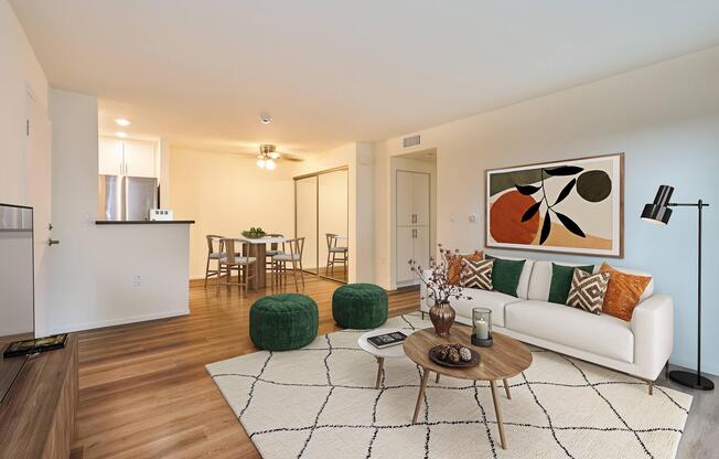 a living room filled with furniture and a rug