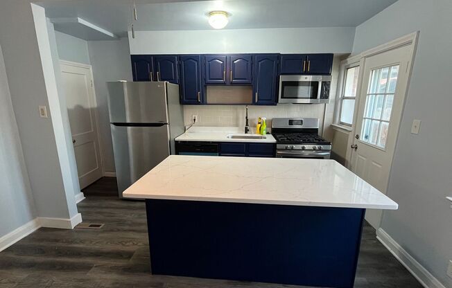 Freshly Renovated Row Home with Beautiful Kitchen!