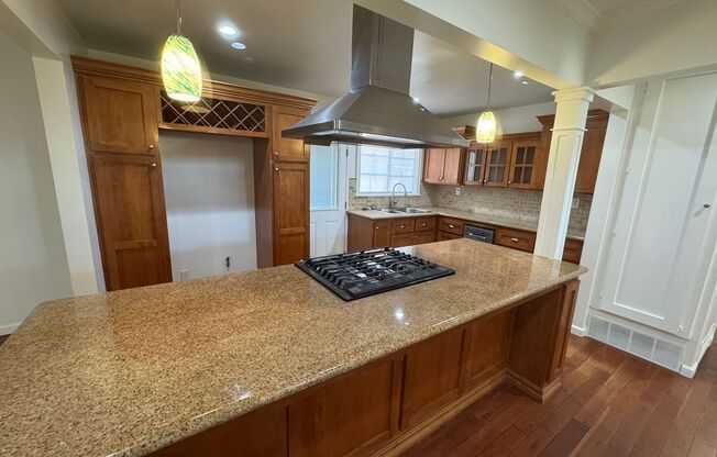 Charming 3 Bed, 2 Bath Single Family Home with Attached Garage and Spacious Backyard