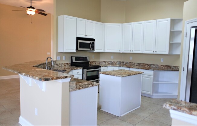 Fall Head Over Heels for this 4 bedroom, 3 bath Fleming Island Gem in Fleming Island Plantation!