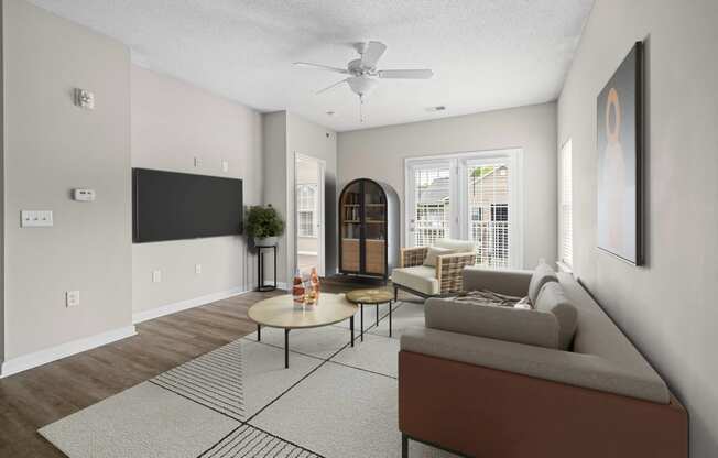 an open living room with a couch and a coffee table