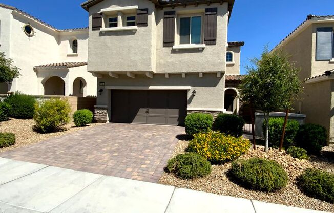 SKYE CANYON 2 STORY WITH PAVER DRIVEWAY AND ENTRY COURTYARD