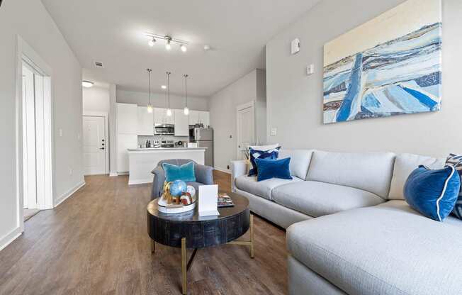 a living room with couches and a coffee table