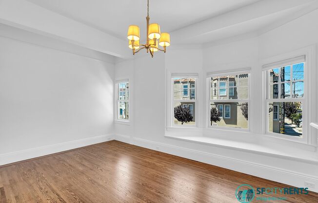 Mission: Bright Corner Condo with Garage Parking & W/D in-unit