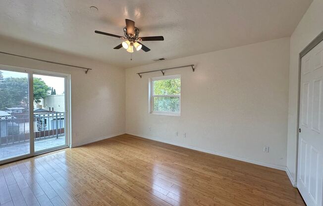 Upstairs 1 Bedroom with tons of Sunshine and Large Balcony!