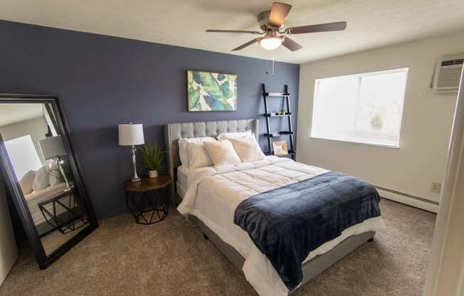 This is a photo of the primary bedroom in the 705 square foot 2 bedroom, 1 bath apartment at Lisa Ridge Apartments in the Westwood neighborhood of Cincinnati, Ohio.