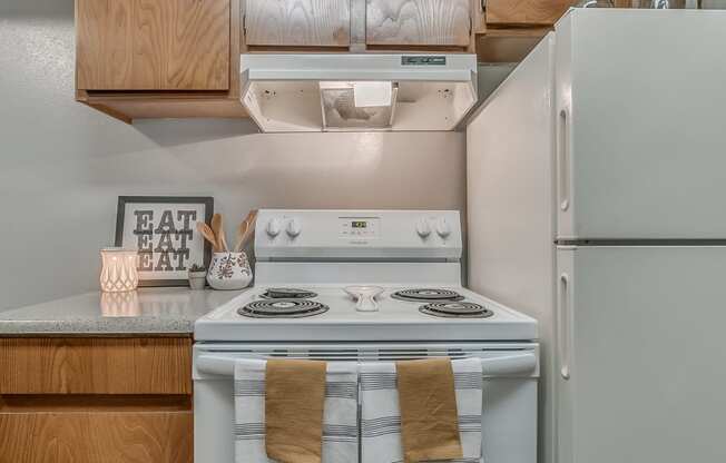 Kitchen Featuring White Appliances