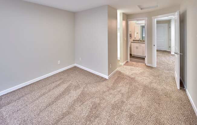 Bedroom area with wooden floor at Arterra Apartments, Kent