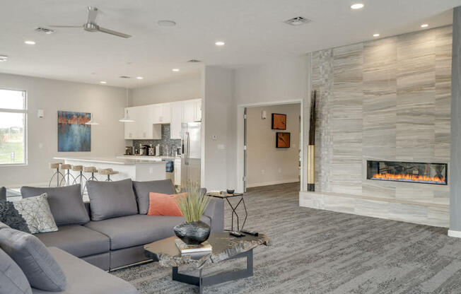 Resident clubhouse with TV lounge and fireplace at The Villas at Falling Waters in west Omaha NE