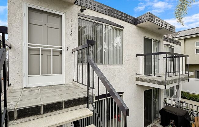 FABULOUS location!  4 blocks to the ocean & Sail Bay, AIR-CONDITIONING, IN-UNIT LAUNDRY! PRIVATE GARAGE + Addn Parking