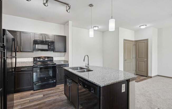 1 & 2-Bedroom Apartments for Rent in Bentonville, AR – Parc at Bentonville – Kitchen with granite countertops