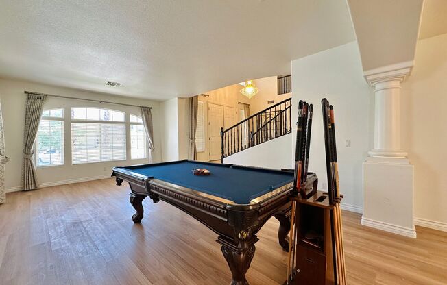 Stunning home in a guard gated community inside Rhodes Ranch with tons of community amenities. Almost 5,000 sq ft home with 3-car garage, 4 bedrooms with 4.5 bathrooms. Huge loft upstairs.