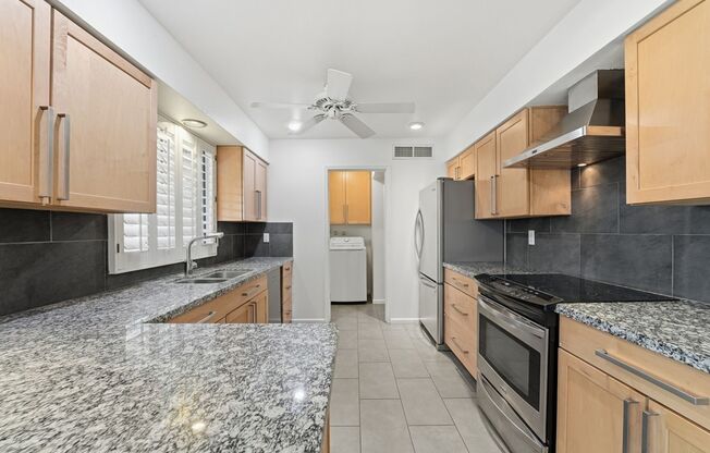 Welcome to this beautiful 4-bedroom, 3-bathroom home in Tempe Arizona!