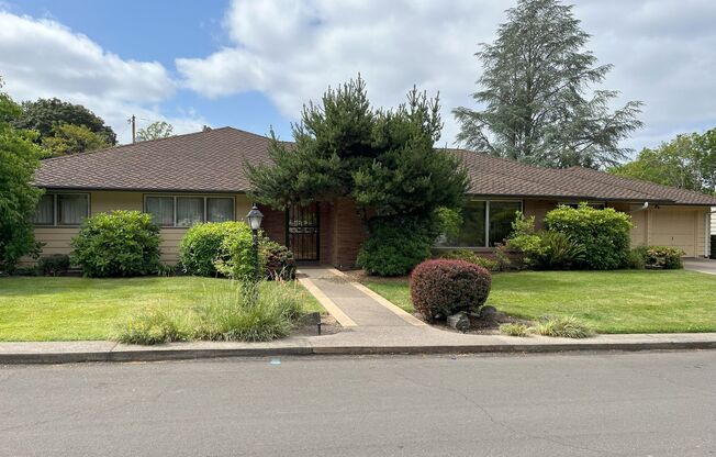 Timeless Character Meets Spacious Living in This Unique 4-Bedroom Vintage Home with A/C
