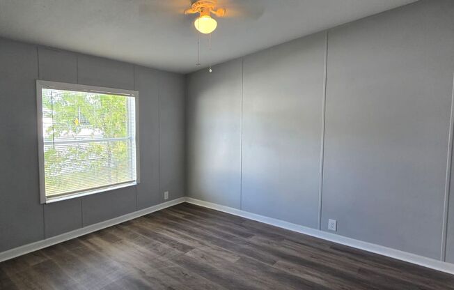 Newly renovated 4/3 property with fenced in yard!