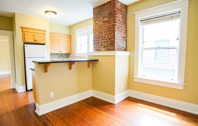 Stunning Top Floor 1-Bed with Exposed Brick + Old-World Charm!