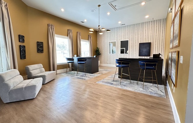 a living room with a couch and a bar