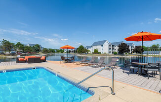 Resort-style swimming pool with sundeck at Waterchase Apartments, Michigan