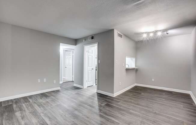 Wood Floor Living Room at Bellaire Oaks Apartments, Houston, Texas