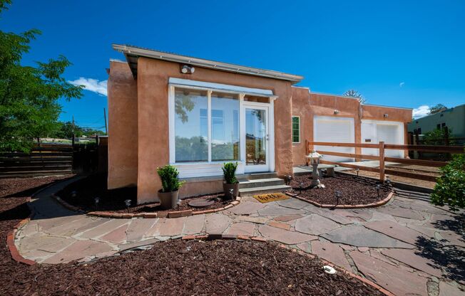 1 MO. FREE RENT! Charming Midtown Santa Fe Home with Yard & Garage