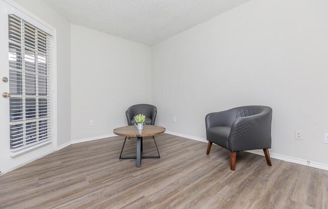 a living room with a wood floor