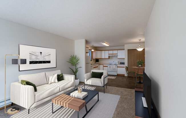 a living room with a white couch and a coffee table. Fargo, ND Eagle Run Apartments
