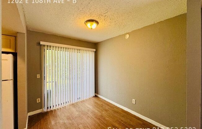 1202 E 108 AVE