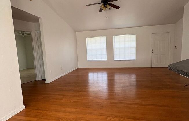 Freshly painted 3 bed 2 bath home w/fenced yard and well service Available NOW!